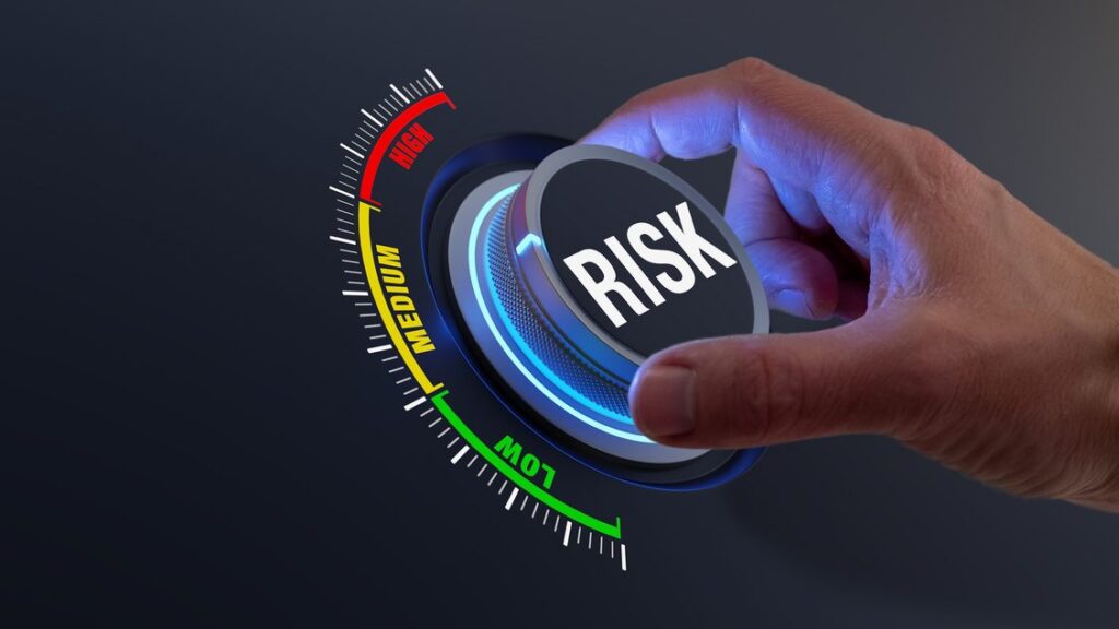 Hand turning a Risk dial